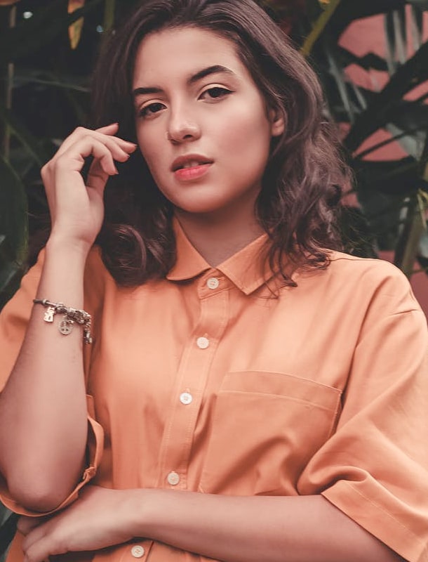 Woman with an orange shirt