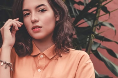 Woman with an orange shirt